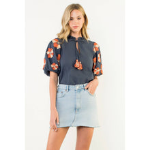 Load image into Gallery viewer, Embroidered Navy Flower Puff Sleeve Tassel Top
