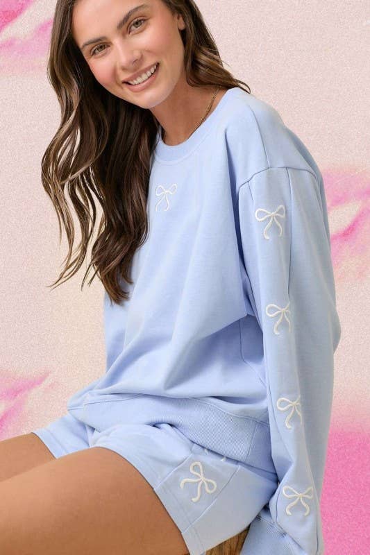 Light Blue Crewneck Long Sleeve Top with Bows